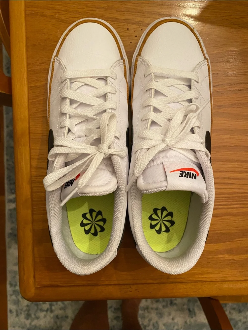 Nike Women’s  White Sneakers with Black Swoosh and Brown Trim
